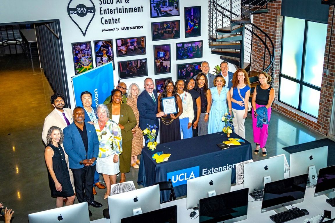 UCLA Extension and SoLa Foundation representatives and community partners gather at the SoLa AI & Entertainment Center in South Los Angeles.
