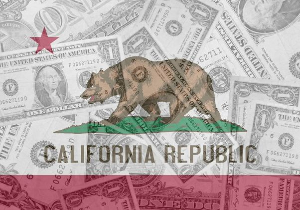The California state flag, featuring a grizzly bear and red star, superimposed over a collage of overlapping U.S. dollar bills