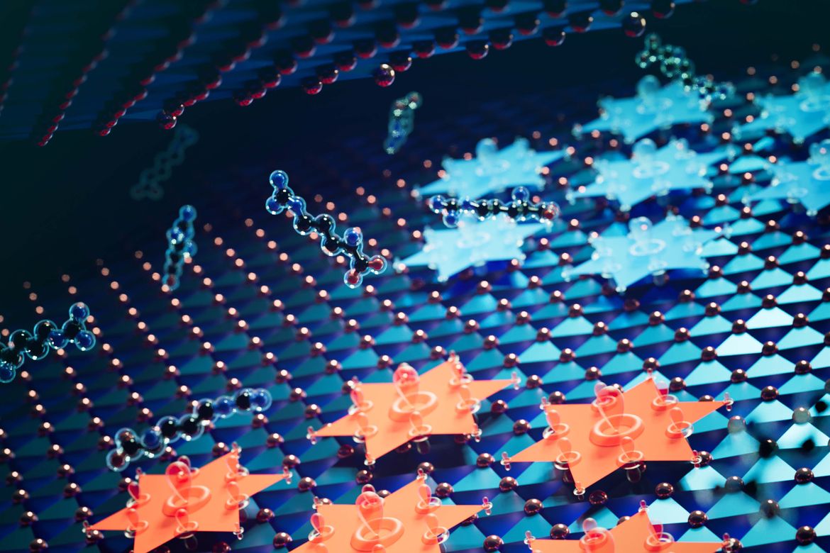 Close-up of a molecular structure with interconnected atoms and hexagonal patterns in blue and orange tones.