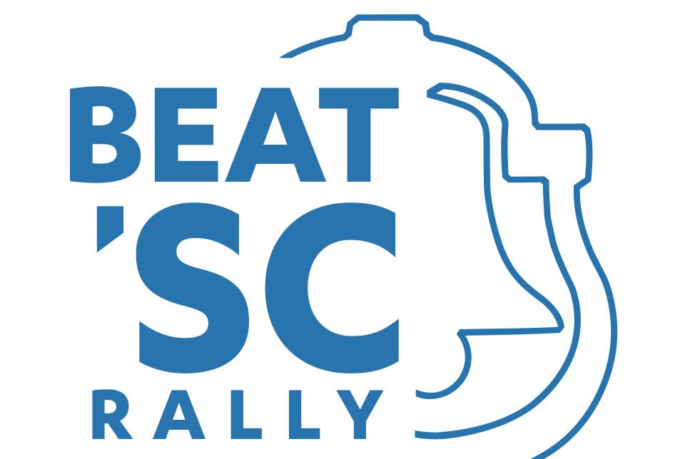 A blue and white graphic design with the text "Beat 'SC Rally" in between an image of a bell.