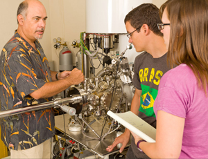 Chemical & Nuclear Engineering Asso. Professor Plamen Atanassov with students