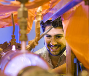 UNM student Steven Candaleria in the School of Engineering Plasma Lab.