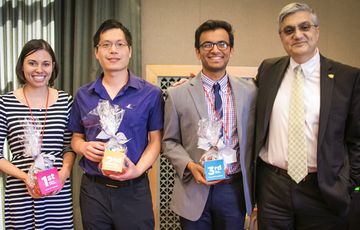 Jocelyn Colella, Lewis Chiang, and Anand Macherla receive awards from Acting President Chaouki Abdallah. LoboBITE Winners