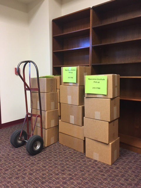 UNM Press books boxed for donation