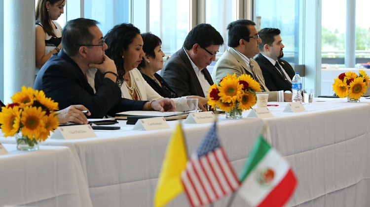 Dr. Gabriel López (center) and