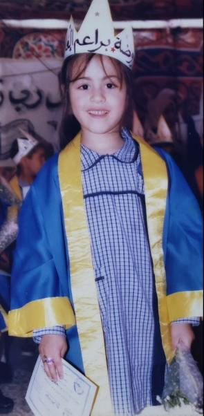 In 1999, Six-year-old Amenah Adi took the first step in her journey. First Step