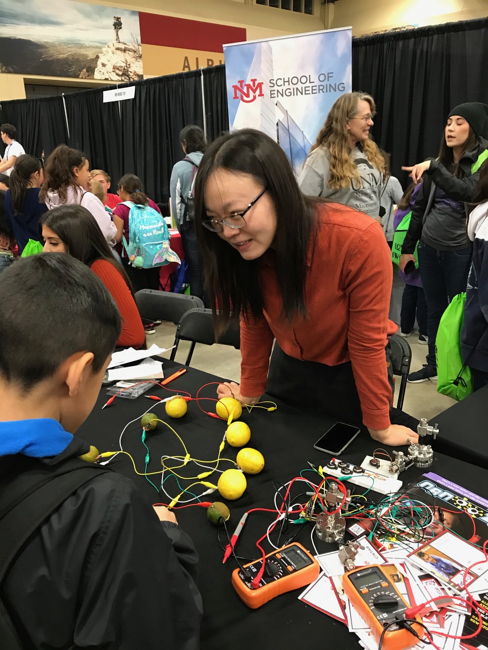 Shuya Wei at an outreach event in 2019 that demonstrates some of her battery research with lemons. shuya-wei-outreach