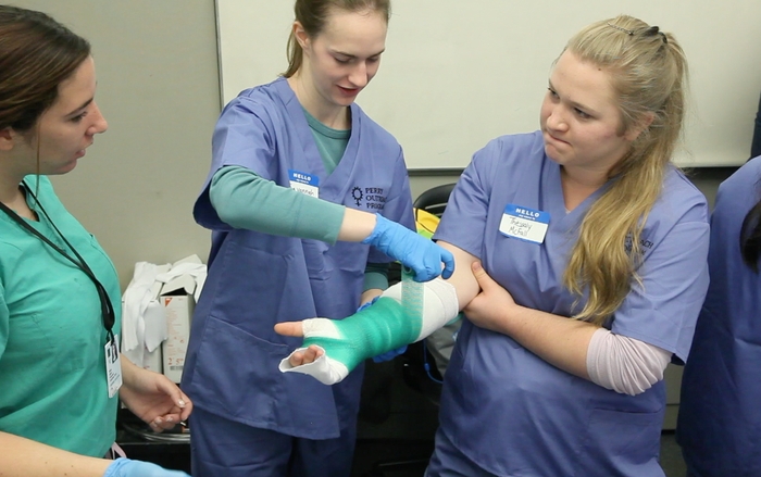 High school students learn skills in orthopedics.