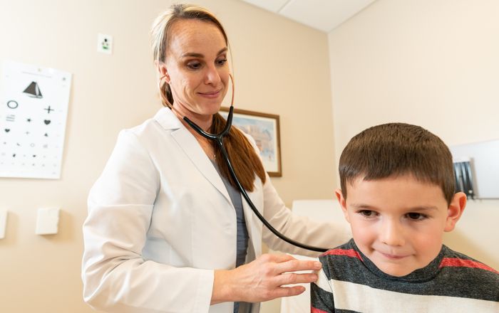 Nurse Practitioner with Patient