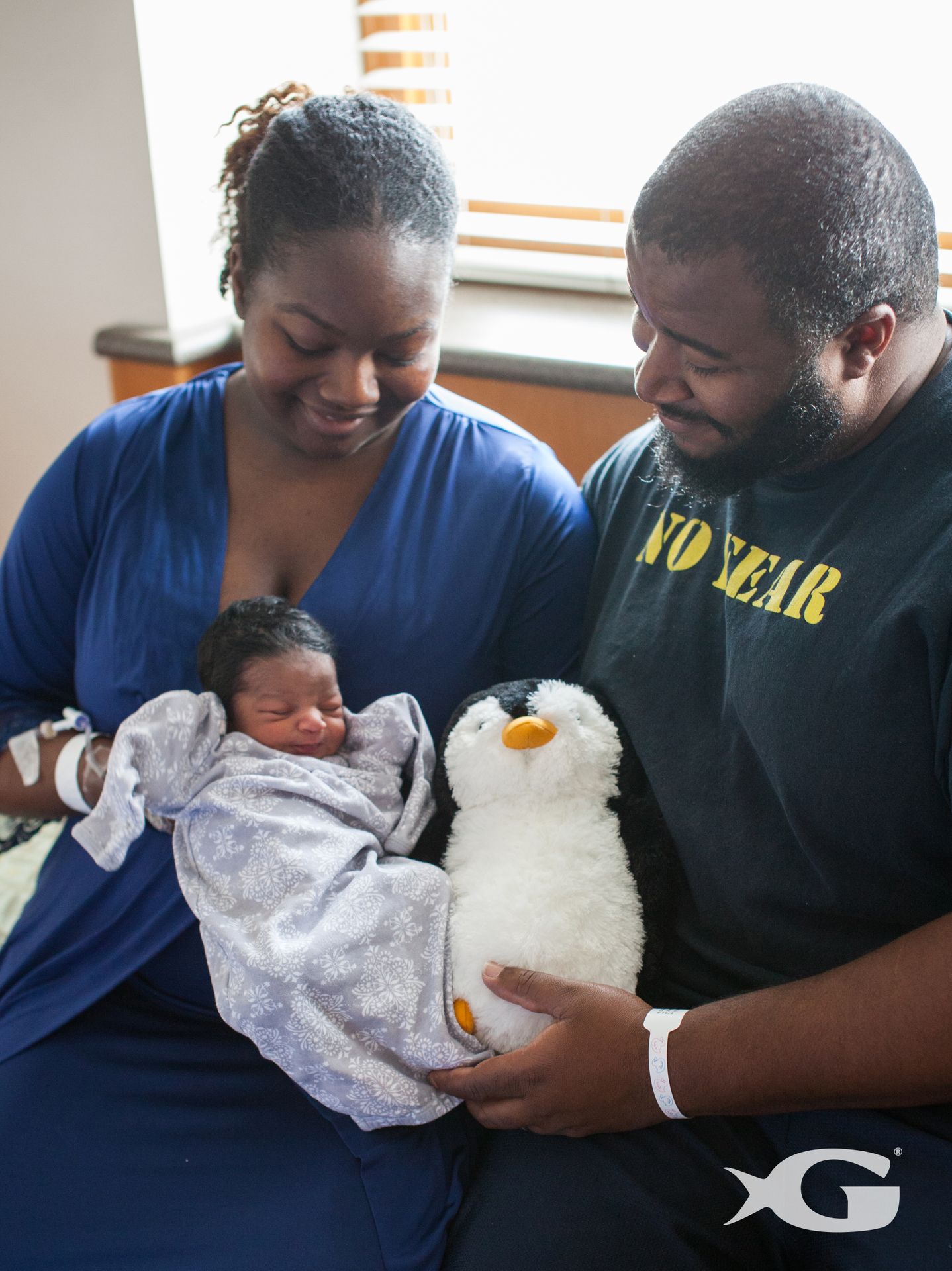 Parents, Newborn and Penguin 1
