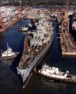 Since Ingalls Shipbuilding opened for business on the east bank of the Pascagoula River in 1938, hundreds of ships have been berthed at the yard’s outfitting piers, including USS Wisconsin (BB 64), pictured during its 1988 reactivation. Ingalls announced today that one of the piers will be brought back into service as part of a reactivation of the company’s original east bank facility. HII photo Ingalls Shipbuilding East Bank