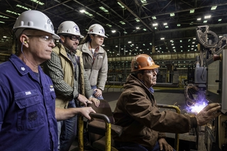 Paul Bosarge, a burner work leaderman at Ingalls Shipbuilding, starts fabrication of steel for the newest Legend-class national security cutter (NSC) Calhoun (WMSL 759). Also pictured, from left, are Cmdr. Jason Dunn, U.S. Coast Guard program manager representative; Braxton Collins, Ingalls’ NSC hull superintendent and Amanda Whitaker, Ingalls’ NSC ship integration manager. Photo by Derek Fountain/HII Start of Fabrication for Tenth NSC