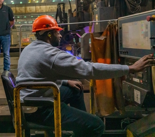 Ingalls Burner specialist Jason Jackson, right, starts fabrication of the Arleigh Burke-class guided missile destroyer George M. Neal (DDG 131) in the Ingalls Shipbuilding Steel Fabrication Shop, observed by Bob Poppenhouse, Ingalls DDG 131 ship program manager; Matt Park, general foreman for Ingalls Fabrication Shop; and Lance Carnahan, director of Ingalls Hull department. George M. Neal (DDG 131) Start Fab