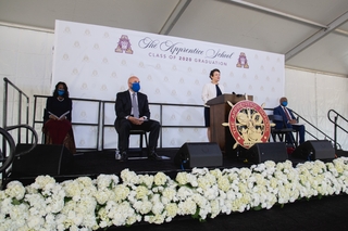 Newport News Shipbuilding President Jennifer Boykin addresses The Apprentice School’s Class of 2020 during graduation exercises at the Hampton Roads Convention Center, April 17, 2021. Also pictured, seated from left, are Latitia McCane, Howard Hoege III and Xavier Beale. Photo by Ashley Cowan/HII Jennifer Boykin Addresses Class of 2020