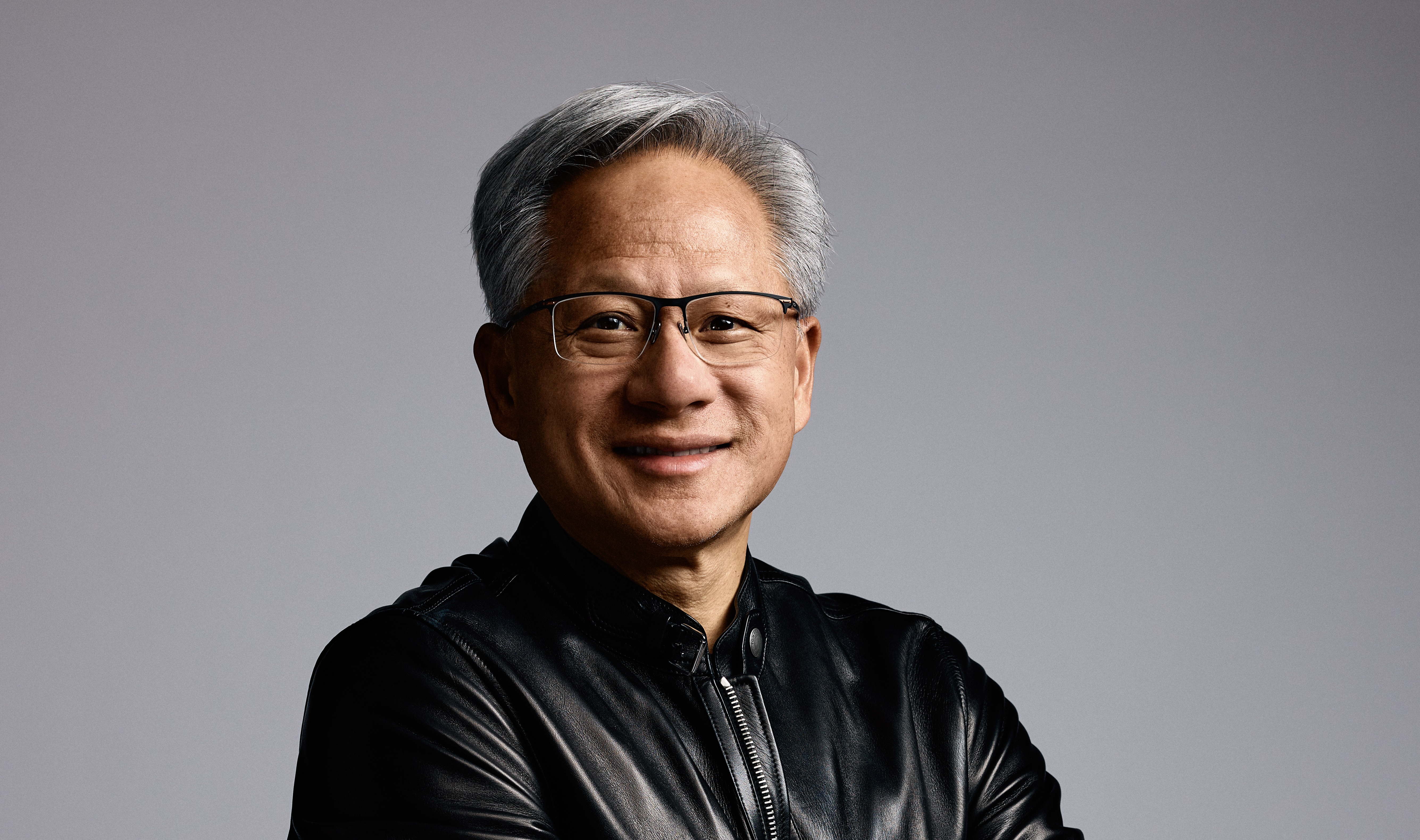 Jensen Huang official NVIDIA headshot in his signature leather jacket