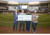 Pictured left to right: Christopher Piotrowski and Eduardo Herrera-Mier of Associated Bank and Cecilia Gore of Brewers Community Foundation present a check in the amount of $100,000 to Trena Bond of Housing Resources, Inc. Pictured left to right: Christopher Piotrowski and Eduardo Herrera-Mier of Associated Bank and Cecilia Gore of Brewers Community Foundation present a check in the amount of $100,000 to Trena Bond of Housing Resources, Inc.