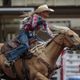 Rodeo competitors brave the rain as Pool B kicks off at the Calgary Stampede