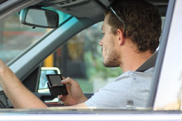 texting while driving courtesy of Lord Jim texting while driving courtesy of Lord Jim