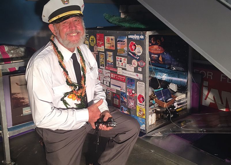 Hawaiian Airlines’ Archivist, Capt. Rick Rogers marked the airline’s 88th anniversary by enshrining “HAL,” a Hawaiian Airlines Time Capsule, beneath a stairwell in Hawaiian’s new Charles I. Elliott Maintenance and Cargo Facility Capt.Rick_HAL_carousel