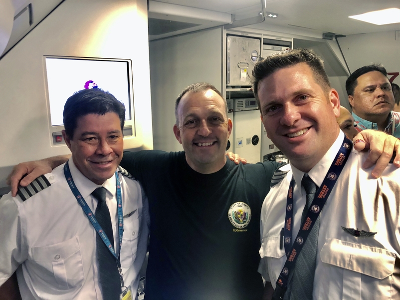 From left: Capt. Kevin Kahauolopua, Hawaii Lt. Gov. Josh Green, and First Officer Ryan Pettit aboard our Airbus A330. Pilots