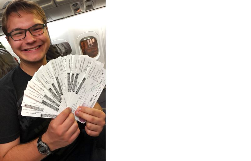 Bachwich with his completed fan of boarding passes on his last flight of the day from LIH to HNL. Alex with tickets