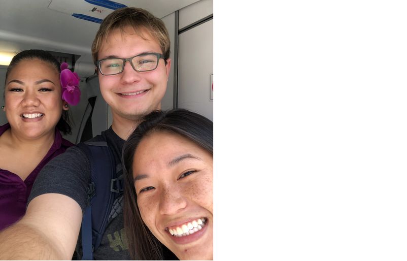 Bachwich (pictured center and right) taking a selfie with an ‘Ohana by Hawaiian flight attendant after their HNL to JHM flight. Alex with OHB