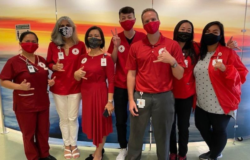 Blood Bank of Hawaii President and CEO Kim-Anh Nguyen with her staff celebrating World Blood Donor Day at the Young Street Donor Center. bbh