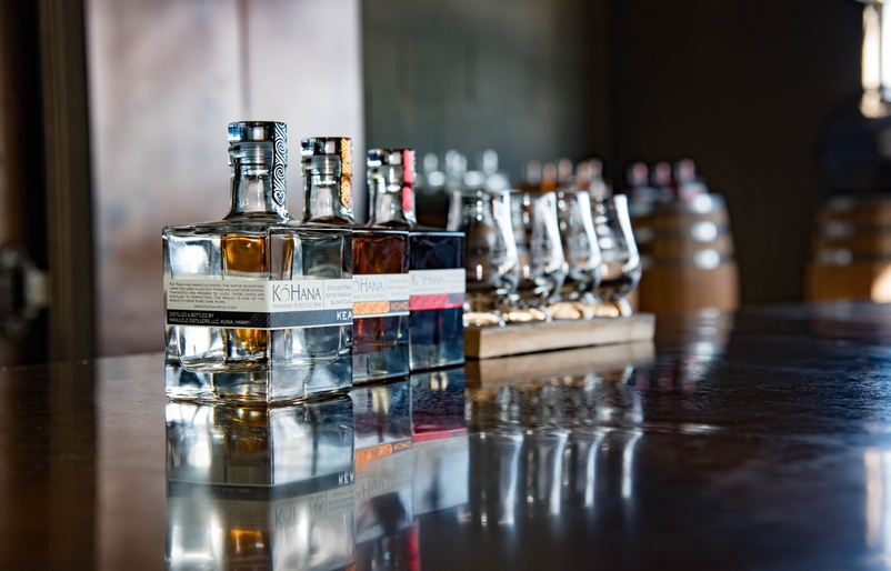 Bottles of rum lined up at Kō Hana's boutique tasting room in Kunia. RHD081915-13