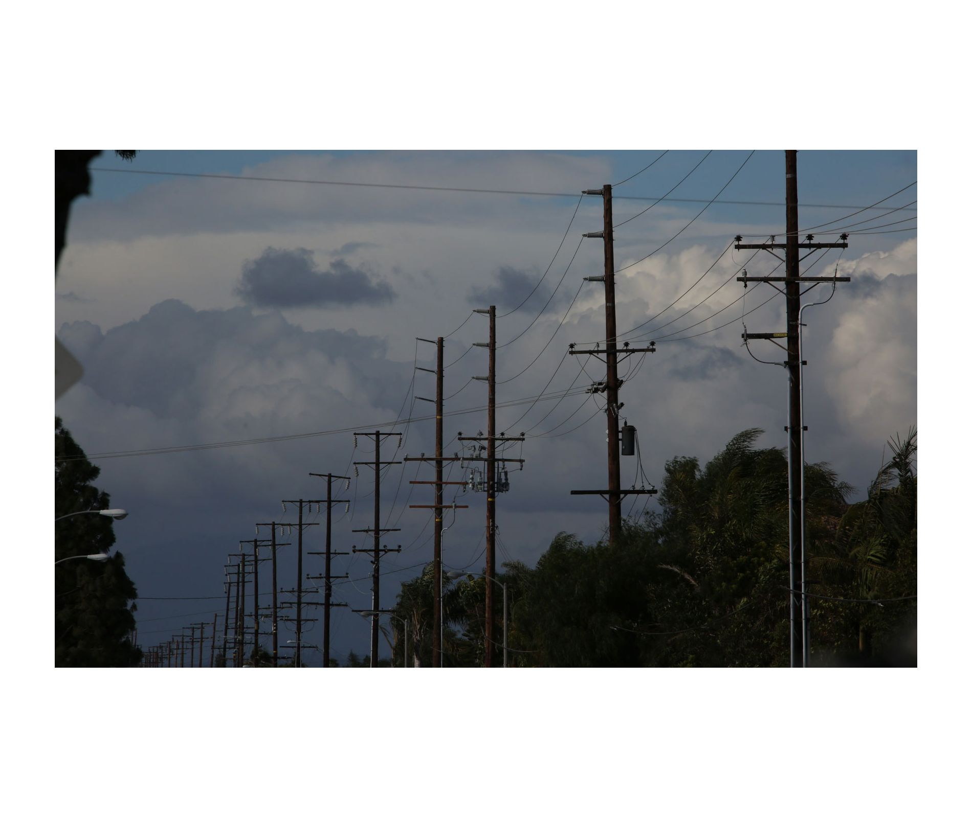 Why Don't Power Lines Sizzle or Steam Up When Rain Hits Them