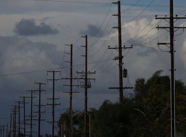 Why Don't Power Lines Sizzle or Steam Up When Rain Hits Them?
