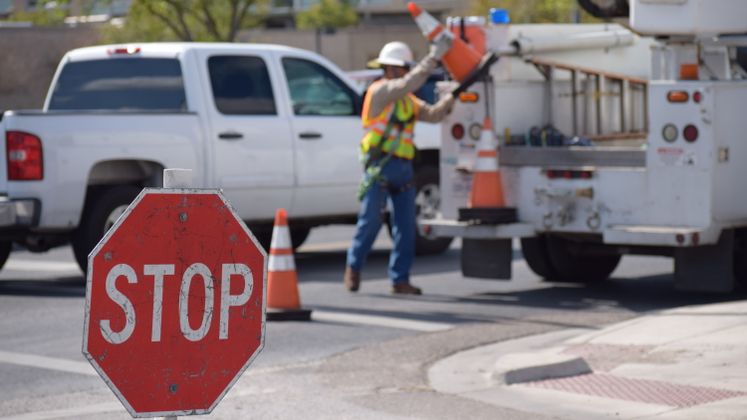 Street Employees working on street lights at Ayers and Kosar