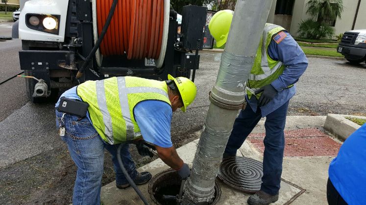 Utilities Crews Cleaning Storm Drains