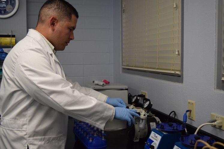 Water Quality Manager G. Ramirez Water Testing at ONSWTP Lab