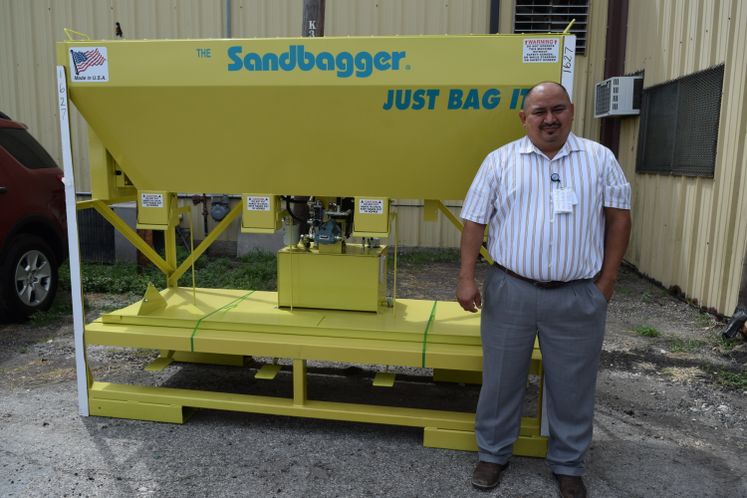 Asst. Director Rolando Mata and the New Sandbagger for Public Works.