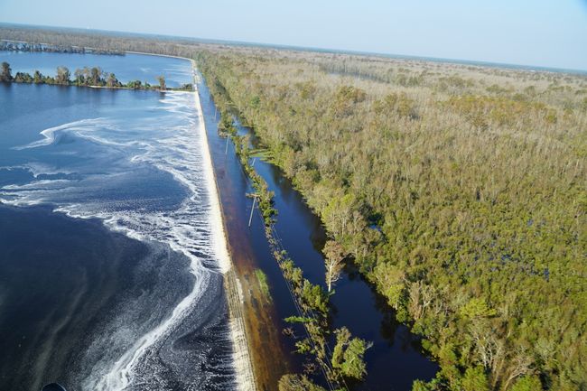 Flood Waters Overtopping Cooling Lake Dam image 1. Photo uploaded on Sept. 20, 2018.