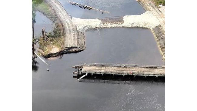 Temporary repair made to the Sutton Lake dam to slow the flow of water out. Photo uploaded Sept. 26, 2018.