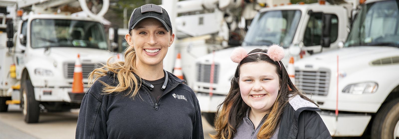 This lineworker shows Mia that girls can dig holes and set poles