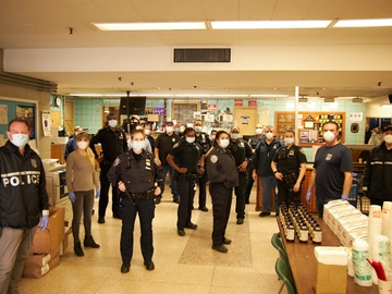 Evy Poumpouras and Dunkin’ deliver Box O’ Joe® cartons, donuts, and more to the NYPD. Evy Poumpouras and Dunkin’ deliver Box O’ Joe® cartons, donuts, and more to the NYPD.