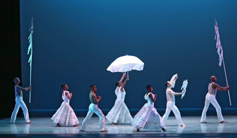 Alvin Ailey American Dance Theater in Alvin Ailey's Revelations. Photo by Donna Ward