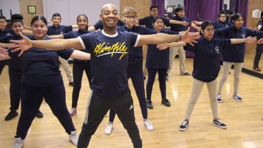 AIE Teaching Artist Cedric Green leads AileyDance Kids at Dual Language Middle School