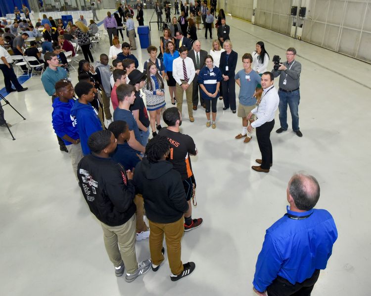 Baltimore-area STEM students participating in “Manufacturing Wars” receive next-step instructions from a Northrop Grumman employee volunteer during Manufacturing Day 2017 as Governor Hogan and Kathy Warden look on. Northrop Grumman Celebrates Manufacturing Day with Maryland Governor, Senators and STEM Students 1