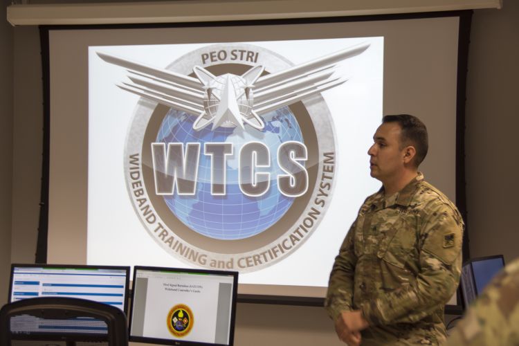 SGT Roy Dilworth III, an instructor at the U.S. Army Signal School in Fort Gordon, GA, demonstrates how students will benefit from the modular, interactive training and simulation system. (Photo Credit: Mr. James Christophersen (PEO EIS)) US Army Unveils Northrop Grumman-Developed First-of-its-Kind Training System for Wideband Satellite Operators 1