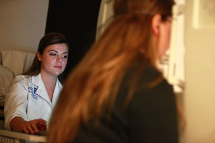 Casey Eye Institute specialist using visual field technology