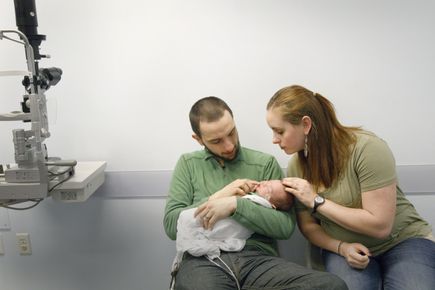 Jonathan Brown of Keizer, Oregon and his wife Mackenzie wait for their 4-month-old baby Nathan's opthalmologist appointment at Casey Eye Institute Elks Children Eye Clinic in Portland, April 5, 2017. Nathan was born at 26-weeks and has retinopathy of prematurity, a common condition in preemies. (OHSU/Kristyna Wentz-Graff) Retinopathy of prematurity (ROP)