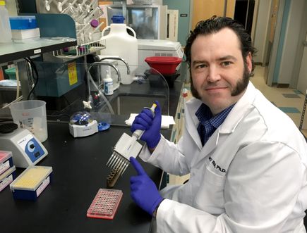 Brian O'Roak, Ph.D., in lab