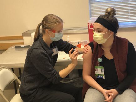 Students and trainees administer COVID-19 vaccines