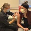 Students and trainees administer COVID-19 vaccines