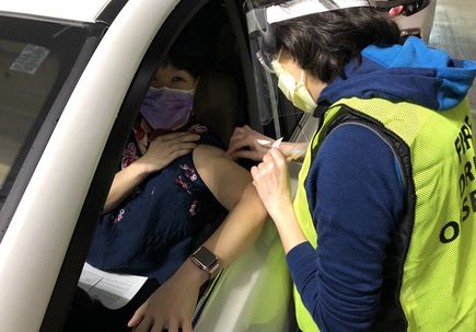 Drive-through COVID-19 vaccine clinics