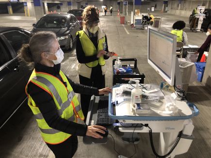 Drive-through COVID-19 vaccine clinics