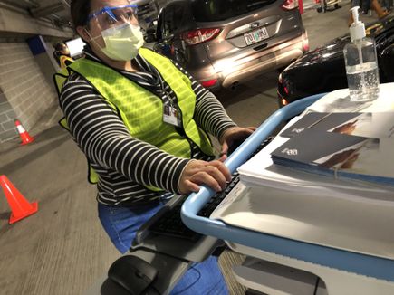 Drive-through COVID-19 vaccine clinics